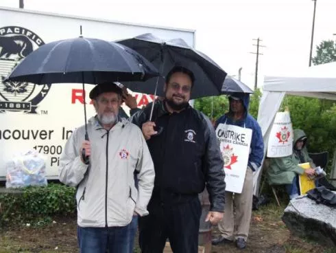 Teamsters Canada Executive Assistant Ron Douglas and Bobby Kornhass walking strike line at CP Rail Strike